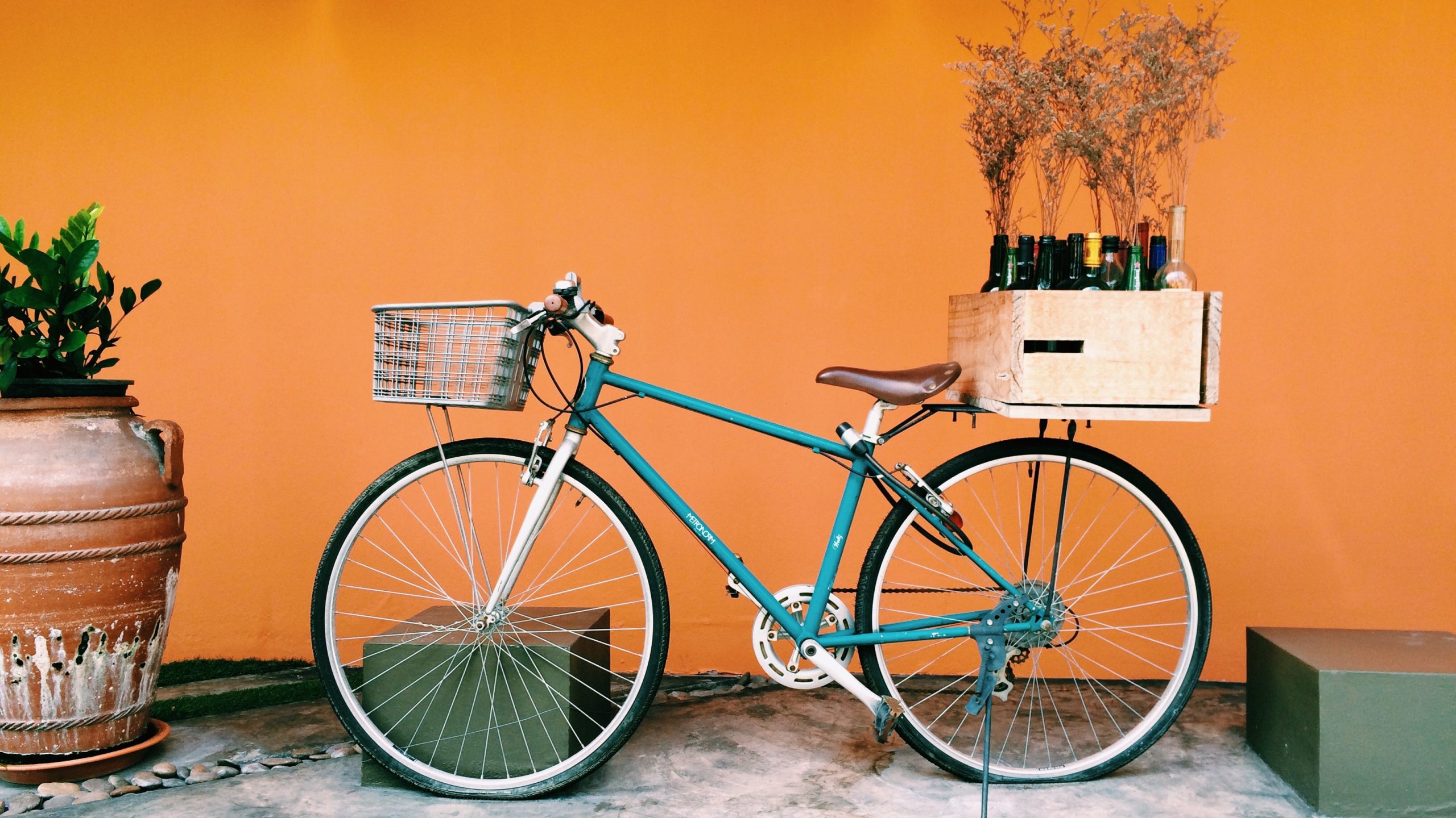 Bicycle depicting a sense of community against an orange background