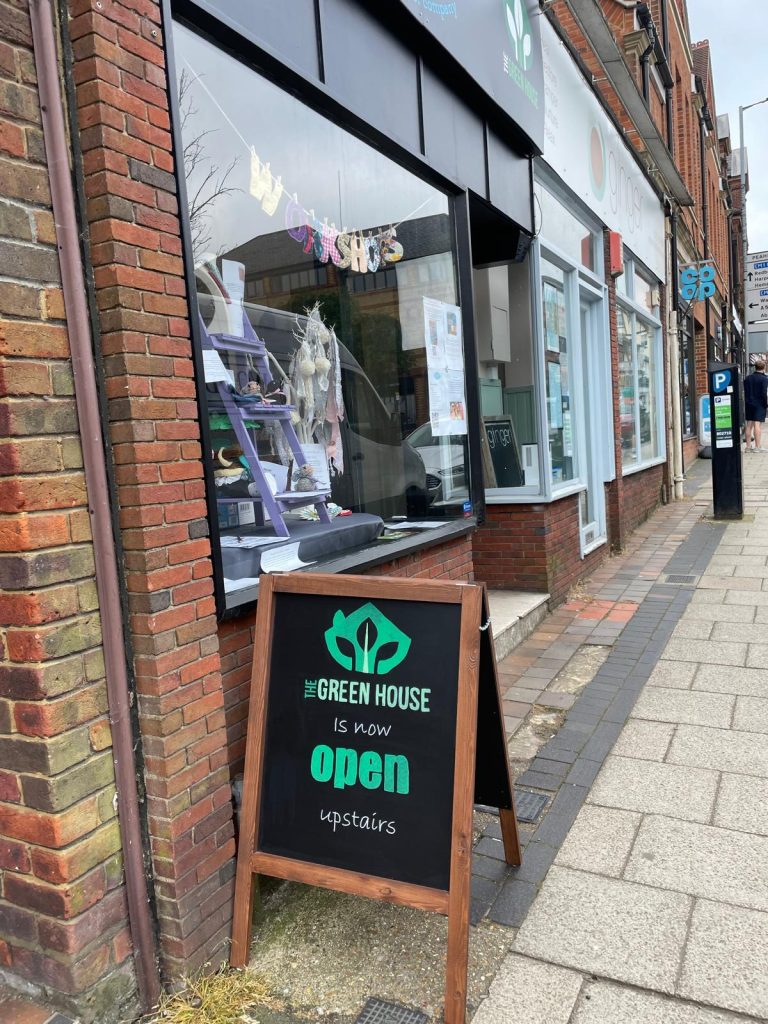 Photo of Green House shopfront with open sign